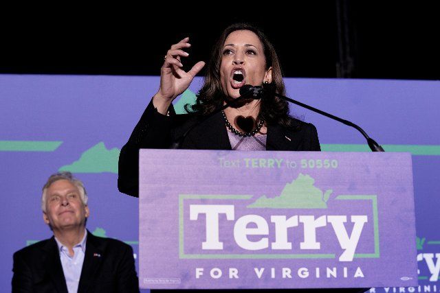United States Vice President Kamala Harris, right, makes remarks at a campaign event for Terry McAuliffe, the Democratic Party nominee for Governor of Virginia, left, in Dumfries, Virginia on Thursday, October 21, 2021. Credit: Yuri Gripas \/ Pool via