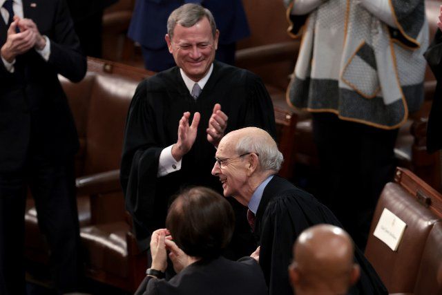 WASHINGTON, DC - MARCH 01: U.S. Supreme Court Associate Justice Stephen Breyer (C) receives applause after being recognized by President Joe Biden during the State of the Union address during a joint session of Congress in the U.S. Capitol\