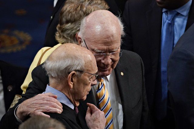 Stephen Breyer, associate justice of the U.S. Supreme Court, left, speaks to Senator Pat Leahy, a Democrat from Vermont, during a State of the Union address by U.S. President Joe Biden at the U.S. Capitol in Washington, D.C., U.S., on Tuesday, March 1, 2022. Biden\