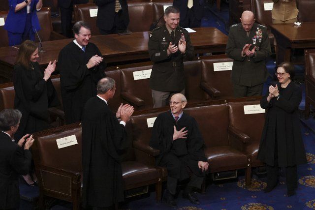 U.S. Supreme Court Chief Justice John Roberts and Associate Justices Amy Coney Barrett, Brett Kavanaugh and Elena Kagan as well as U.S. Army Chief of Staff General James McConville and U.S. Marines Chief of Staff General David Berger applaud retiring Supreme Court Justice Stephen Breyer as Breyer is honored by President Joe Biden during Biden\