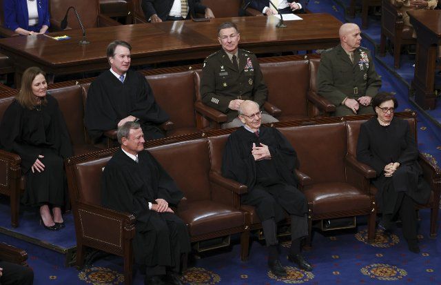Retiring Supreme Court Justice Stephen Breyer reacts as President Joe Biden honors Breyer during Biden\