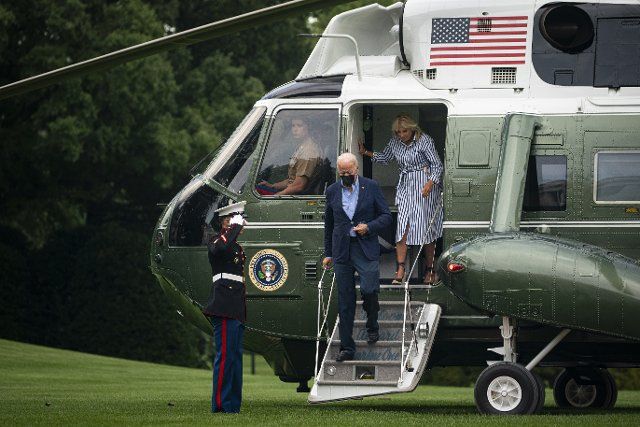 United States President Joe Biden and First Lady Jill Biden arrive on Marine One on the South Lawn of the White House in Washington, D.C., US, on Monday, Aug. 8, 2022. Biden resumed official travel today for the first time since his bout with Covid-19, traveling to Kentucky to show federal support for the state\