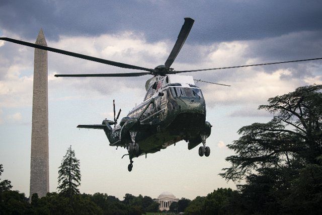 Marine One, with United States President Joe Biden aboard, lands on the South Lawn of the White House in Washington, D.C., US, on Monday, Aug. 8, 2022. Biden resumed official travel today for the first time since his bout with Covid-19, traveling to Kentucky to show federal support for the state\