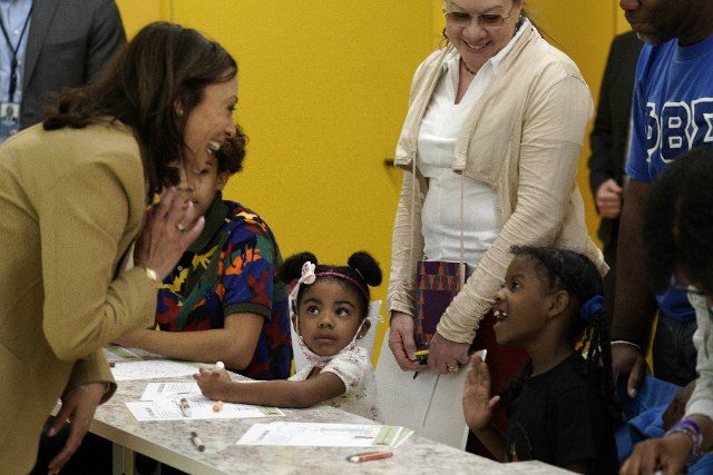United States Vice President Kamala Harris greets children at the art class as she visits the National Museum of African American History and Culture to mark a Juneteenth in Washington on June 20, 2022. Credit: Yuri Gripas \/ Pool via