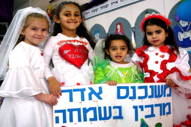 ASHKELON - MARCH 02: Israeli girls celebrate the Jewish holiday Purim on March 02 2007 in kindergarden in Ashkelon Israel