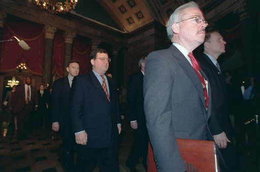 1\/7\/99 IMPEACHMENT TRIAL--Bob Barr R-Ga. and other House trial managers walk through Statuary Hall on their way to present the Articles of Impeachment on the Senate floor. CONGRESSIONAL QUARTERLY PHOTO BY SCOTT J.