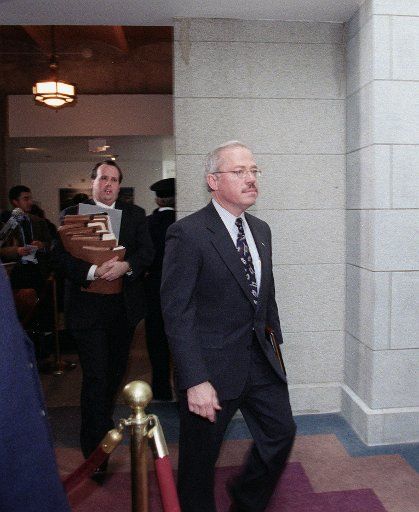 12-19-98 IMPEACHMENT VOTE--Bob BarrR-Ga. walks to the GOP caucus in the U.S. Capitol after the impeachment vote. CONGRESSIONAL QUARTERLY PHOTO BY DOUGLAS