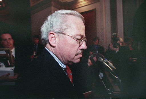1\/14\/99 IMPEACHMENT TRIAL--Bob Barr R-Ga. makes his way past reporters in Statuary Hall at the end of the first full day of the impeachment trial of President Bill Clinton. CONGRESSIONAL QUARTERLY PHOTO BY DOUGLAS