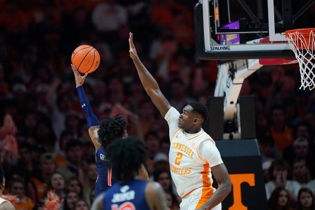 February 26, 2022: Brandon Huntley-Hatfield #2 of the Tennessee Volunteers blocks the shot attempt by Wendell Green Jr. #1 of the Auburn Tigers during the NCAA basketball game between the University of Tennessee Volunteers and the Auburn Tigers at Thompson Boling Arena in Knoxville TN Tim Gangloff