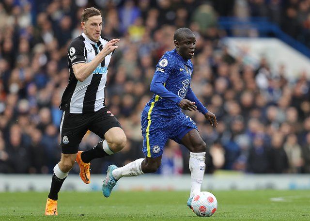 March 13, 2022, London, United Kingdom: London, England, 13th March 2022. Ngolo Kante of Chelsea and Chris Wood of Newcastle United during the Premier League match at Stamford Bridge, London. Picture credit should read: Paul Terry 
