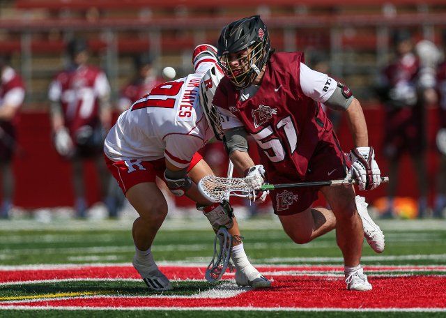 March 15, 2022: Lafayette midfielder James Turco (51) wins the face-off during an NCAA lacrosse game between the Lafayette Leopards and the Rutgers Scarlet Knights at SHI Stadium in Piscataway, NJ. Rutgers defeated Lafayette 22-10. Mike Langish\/Cal Sport Media