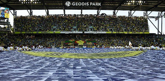 June 19, 2022: Nashville SC stretch out the banner for the Juneteenth Holiday during the first half of an MLS game between Sporting Kansas City and Nashville SC at Geodis Park in Nashville TN Steve Roberts