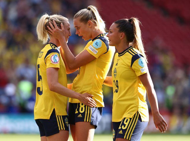 July 13, 2022, Sheffield, United Kingdom: Sheffield, England, 13th July 2022. Fridolina Rolfo of Sweden celebrates the win with Rebecka Blomqvist of Sweden during the UEFA Women\