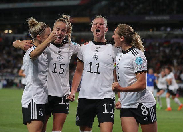 July 27, 2022, Milton Keynes, United Kingdom: Milton Keynes, England, 27th July 2022. Alexandra Popp of Germany celebrates after scoring to make it 2-1 during the UEFA Women\