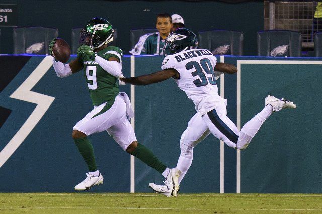 August 12, 2022: New York Jets wide receiver Calvin Jackson (9) with the touchdown catch with Philadelphia Eagles cornerback Josh Blackwell (39) defending during the NFL pre-season game between the New York Jets and the Philadelphia Eagles at Lincoln Financial Field in Philadelphia, Pennsylvania. Christopher Szagola