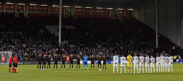 September 27, 2022, Sheffield, United Kingdom: Sheffield, England, 27th September 2022. Both teams take part in a minutes reflection on the passing of Her majesty the Queen Elizabeth ll during the International Friendly match at Bramall Lane, Sheffield