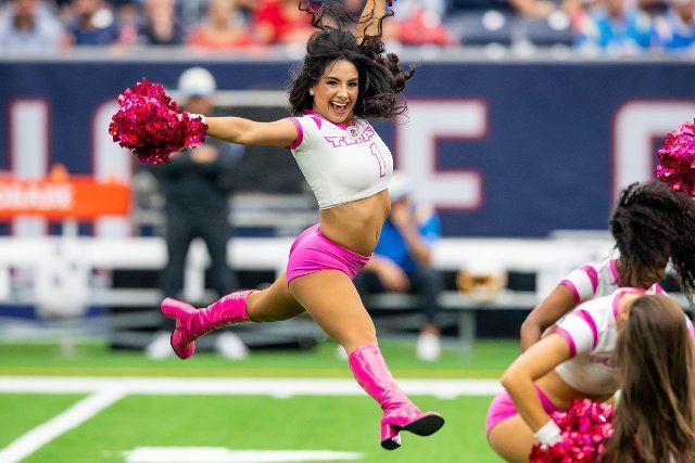 October 2, 2022: A Houston Texans cheerleader performs prior to an NFL football game between the Los Angeles Chargers and the Houston Texans at NRG Stadium in Houston, TX. ..Trask Smith