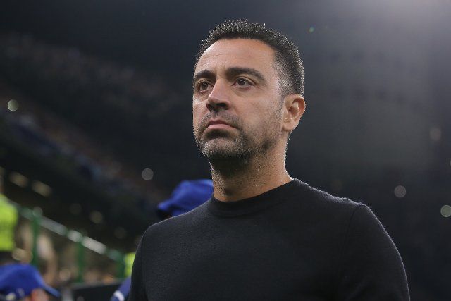 October 4, 2022, Milan, United Kingdom: Milan, Italy, 4th October 2022. Xavi Hernandez Head coach of FC Barcelona makes his way to the bench prior to kick off in the UEFA Champions League Group C match at Giuseppe Meazza, Milan