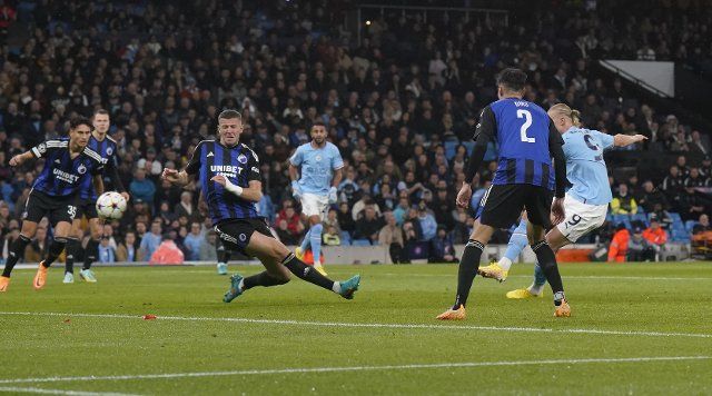 October 5, 2022, Manchester, United Kingdom: Manchester, England, 5th October 2022. Erling Haaland of Manchester City scores the first goal during the UEFA Champions League match at the Etihad Stadium, Manchester