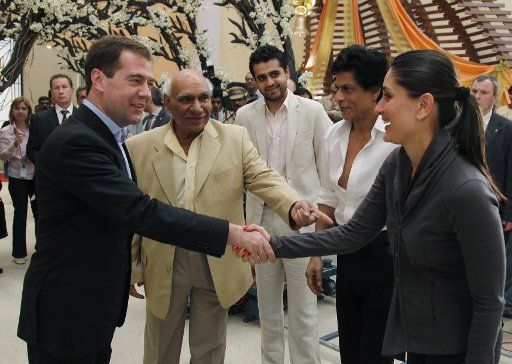 (L-R) President of Russia Dmitry Medvedev meets Indian director Yash Chopra and actor Shah Rukh Khan while visiting a Bollywood film studio in Mumbai India on december 22 2010. Photo by Dmitry Astakhov\/Itar-Tass\/ABACAPRESS.COM