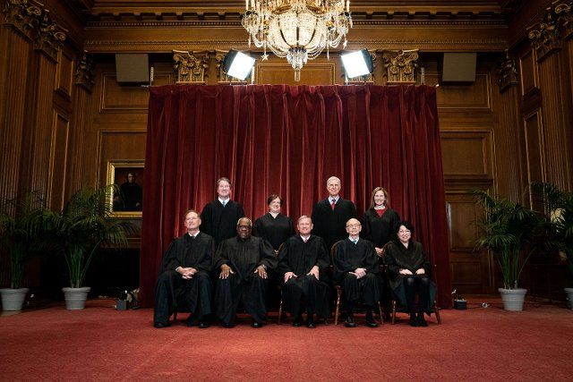 Members of the Supreme Court pose for a group photo at the Supreme Court in Washington, DC, USA on April 23, 2021. Seated from left: Associate Justice Samuel Alito, Associate Justice Clarence Thomas, Chief Justice John Roberts, Associate Justice Stephen Breyer and Associate Justice Sonia Sotomayor, Standing from left: Associate Justice Brett Kavanaugh, Associate Justice Elena Kagan, Associate Justice Neil Gorsuch and Associate Justice Amy Coney Barrett. Photo by Erin Schaff\/Pool\/ABACAPRESS
