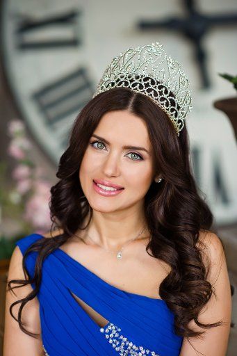 Mrs Russia 2013, Yulia Ionina of St Petersburg wearing a tiara. Yulia is to represent Russia in the 2014 Mrs World beauty contest. Moscow, Russia on August 1, 2014. Photo by Itar-Tass\/ABACAPRESS.