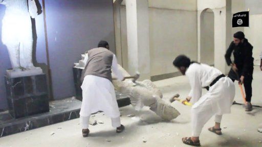 A video posted on internet on February 26, 2015 shows ISIS or Daesh (Daech) or "Islamic State" group militants destroying statues inside the Nineveh museum, northern Iraq. Some of the statues date from 8th century BC. Photo by Balkis Press\/...