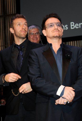 Chris Martin (L) of British band Coldplay and Irish singer Bono of the band U2 attend the award ceremony of the Prince Bernhard Cultural Prize 2011 in Amsterdam The Netherlands on November 2011. Photo by P.van Emst\/DPA\/ABACAUSA.COM #