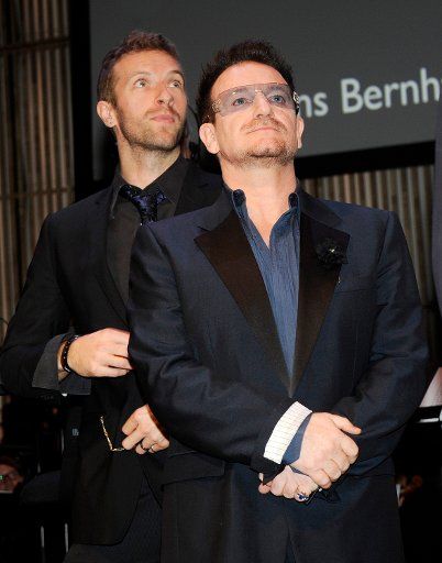 Chris Martin (L) of British band Coldplay and Irish singer Bono of the band U2 attend the award ceremony of the Prince Bernhard Cultural Prize 2011 in Amsterdam The Netherlands on November 2011. Photo by P.van Emst\/DPA\/ABACAUSA.COM #