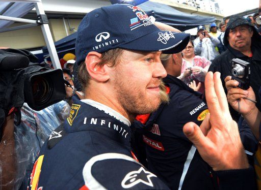 German Formula One driver Sebastian Vettel of Red Bull celebrates his third world championship in a row after the Formula One Grand Prix of Brazil at Autodromo Jose Carlos Pace in Sao Paulo, Brazil on November 25, 2012. Photo by David Ebener\/DPA\/...