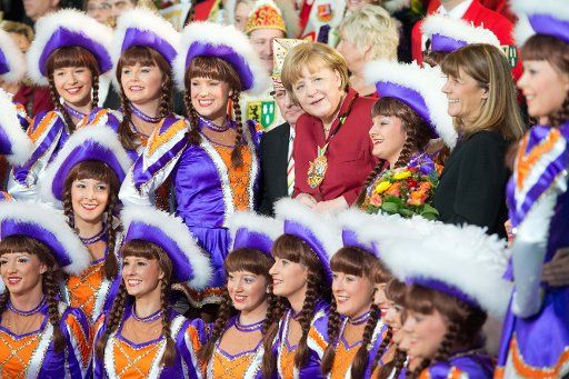 German Chancellor Angela Merkel receives carnival enthusiasts during the traditional carnival reception at the Federal Chancellery in Berlin, Germany, January 29, 2013. Photo by Maurizio Gambarini\/DPA\/ABACAPRESS.COM