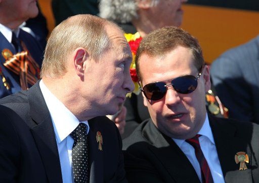President of Russia Vladimir Putin (L) and Prime Minister Dmitry Medvedev watching the Victory Day military parade in Red Square. Moscow, Russia, May 9, 2013. Photo by Mikhail Klimentyev\/Itar-Tass\/ABACAPRESS.