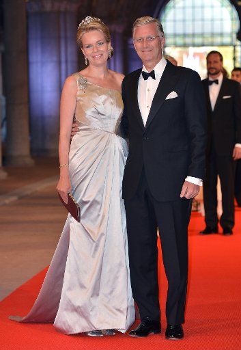 Princess Mathilde of Belgium and Prince Philippe of Belgium arrive for a dinner at the occasion of the abdication of Dutch Queen Beatrix and the investiture of Prince Willem Alexander as King, in the Rijksmuseum, in Amsterdam, The Netherlands on ...