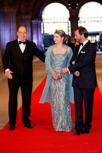 Prince Albert of Monaco, Hereditary Grand Duke Guillaume and Hereditary Grand Duchess Stephanie of Luxembourg arrive at the Rijksmuseum dinner hosted by Queen Beatrix of the Netherlands on the eve of her abdication in Amsterdam, The Netherlands on ...