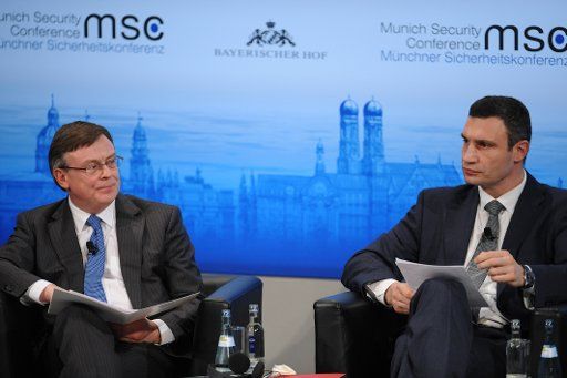 Minister of Foreign Affairs of Ukraine, Leonid Kozhara (L) and Ukrainian member of the opposition and former world heavyweight champion, Vitali Klitschko, participate in discussions at the 50th Security Conference in Munich, Germany, 01 February ...