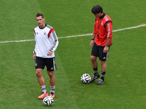 German head coach Joachim Loew and player Miroslav Klose during a training session at the Estadio Beira-Rio in Porto Alegre, Brazil, June 29, 2014. Germany faces Algeria in a FIFA soccer World Cup round of sixteen match on 30 June 2014. Photo by ...