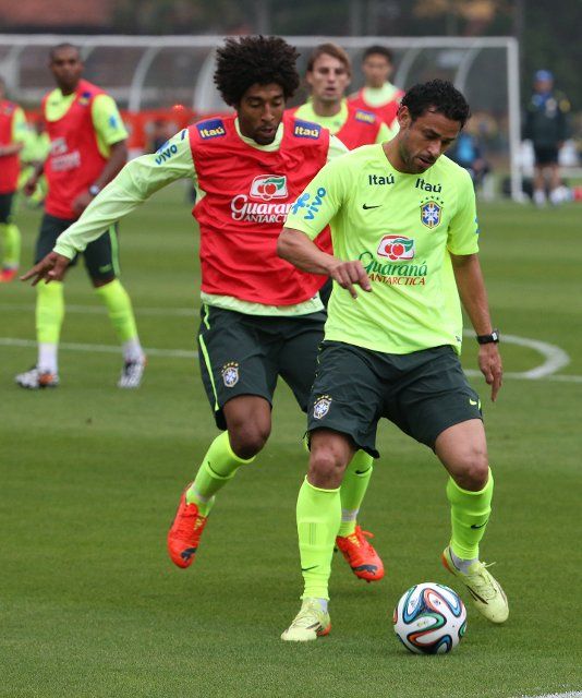 Dante e Fred during a training session of the Brazilian national football team at the Granja Comary training center in Teresopolis, Rio de Janeiro, Brazil, on June 9, 2014. Brazilian team prepares for the 2014 Fifa World Cup. Photo by Wilton Junior\/...