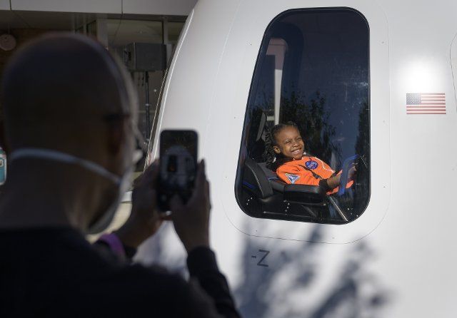 9-year old Amara Bowman smiles as her father photographs her inside a Blue Origin New Shepard capsule mockup prior to the screening of the NASA produced documentary ÒThe Color of SpaceÓ at Howard UniversityÕs Cramton Auditorium in Washington, Saturday, June 18, 2022. Premiering on Juneteenth, the federal holiday commemorating the end of slavery in the United States, ÒThe Color of SpaceÓ is an inspirational documentary that tells the stories of NASAÕs Black astronauts determined to reach the stars. Mandatory Credit: Bill Ingalls \/ NASA via CNP
