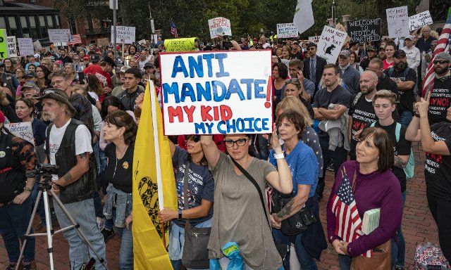 September 17, 2019, Boston, Massachusetts, USA: Anti Covid-19 vaccination supporters rally at Freedom rally in front of Massachusetts Statehouse in Boston. (Photo by Keiko Hiromi\/AFLO