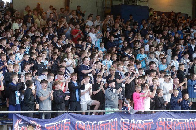 12th August 2022; Dens Park, Dundee, Scotland: Scottish League Championship football, Dundee versus Arbroath ; Dundee fans join in the minutes applause in memory of Dundee FC legend Pat