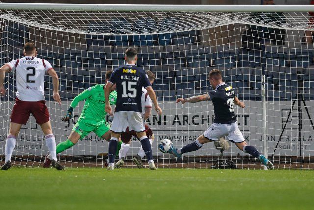 12th August 2022; Dens Park, Dundee, Scotland: Scottish League Championship football, Dundee versus Arbroath ; Colin Hamilton of Arbroath scores an equaliser to level the score at 2-2 in the 81st minute