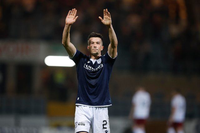 12th August 2022; Dens Park, Dundee, Scotland: Scottish League Championship football, Dundee versus Arbroath ; Cammy Kerr of Dundee applauds the fans at the end of the