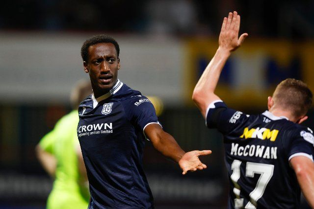 12th August 2022; Dens Park, Dundee, Scotland: Scottish League Championship football, Dundee versus Arbroath ; Zach Robinson of Dundee celebrates after scoring for 3-2 with Luke