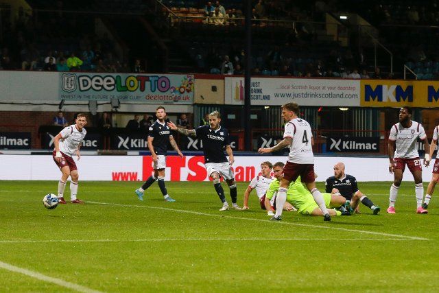 12th August 2022; Dens Park, Dundee, Scotland: Scottish League Championship football, Dundee versus Arbroath ; Zak Rudden of Dundee scores for 2-1 in the 64th minute