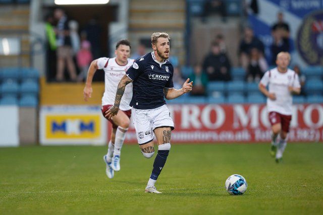 12th August 2022; Dens Park, Dundee, Scotland: Scottish League Championship football, Dundee versus Arbroath ; Tyler French of Dundee races