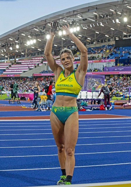 2nd August 2022; Alexander Stadium, Birmingham, Midlands, England: Day 5 of the 2022 Commonwealth Games: Nina Kennedy (AUS) celebrates with her arms raised after winning the Gold Medal in the Pole Vault with a height of 4