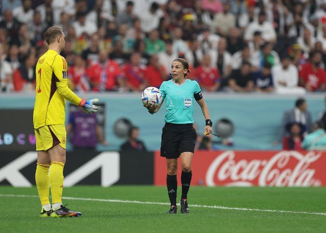 1st December 2022; Al Bayt Stadium, Al Khor, Qatar; FIFA World Cup Football, Costa Rica versus Germany; Referee Stephanie Frappart gives the ball to Goalkeeper Manuel Neuer of Germany to restart the