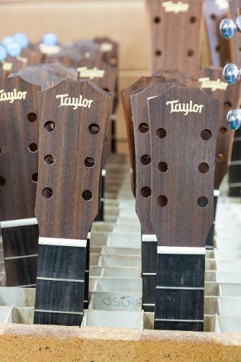 Unfinished guitar neck headstocks await assembly in the production of Taylor guitars in their Tecate, Mexico factory