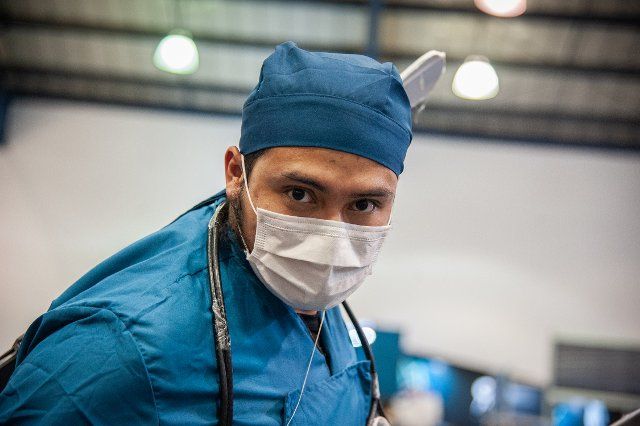 An attendee cosplays a doctor as an aim to showcase how medics are heroes too during the fourth day of the SOFA (Salon del Ocio y la Fantasia) 2021, a fair aimed to the geek audience in Colombia that mixes Cosplay, gaming, superhero and movie fans from across Colombia, in Bogota, Colombia on October 17, 2021