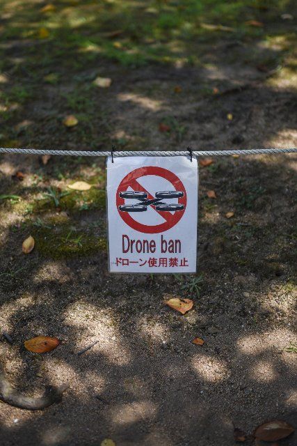 Drone ban sign in Himeji Castle (HimejijÅ), also known as White Heron Castle, is Japanâs best preserved feudal